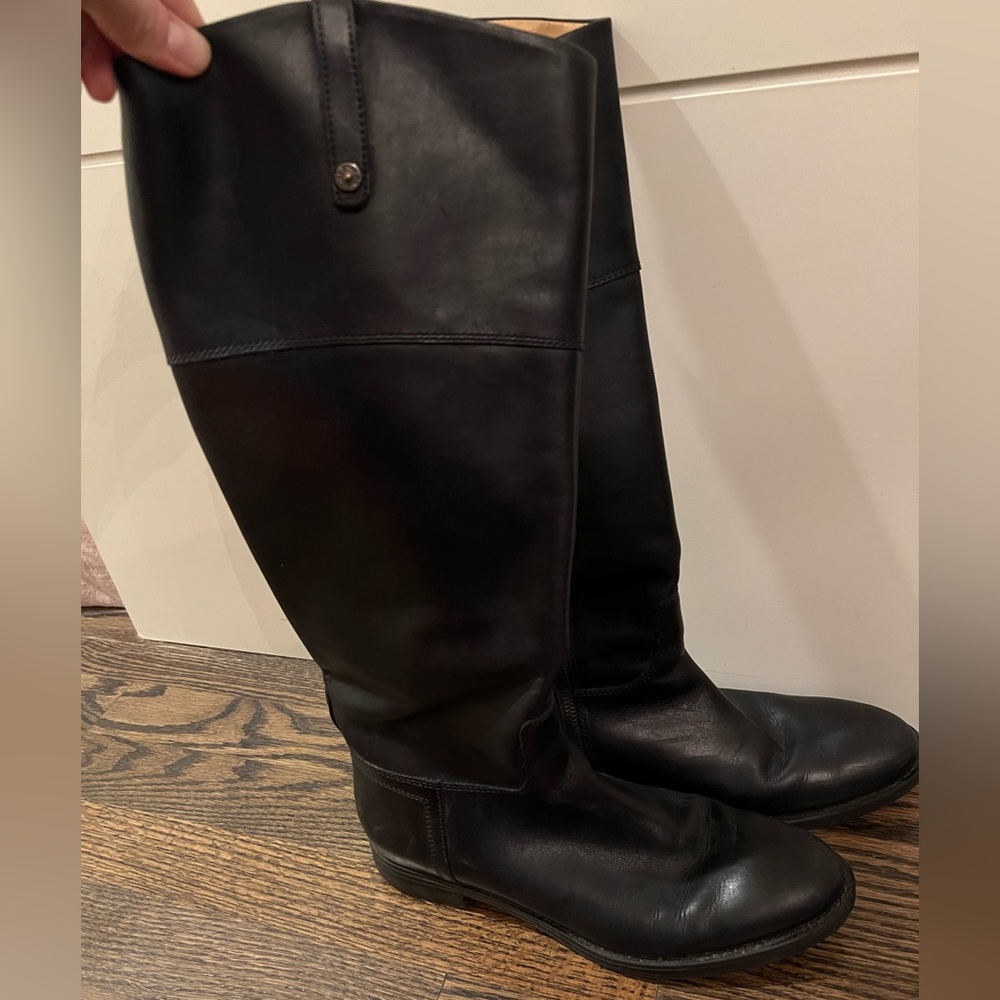 Tall black leather boots